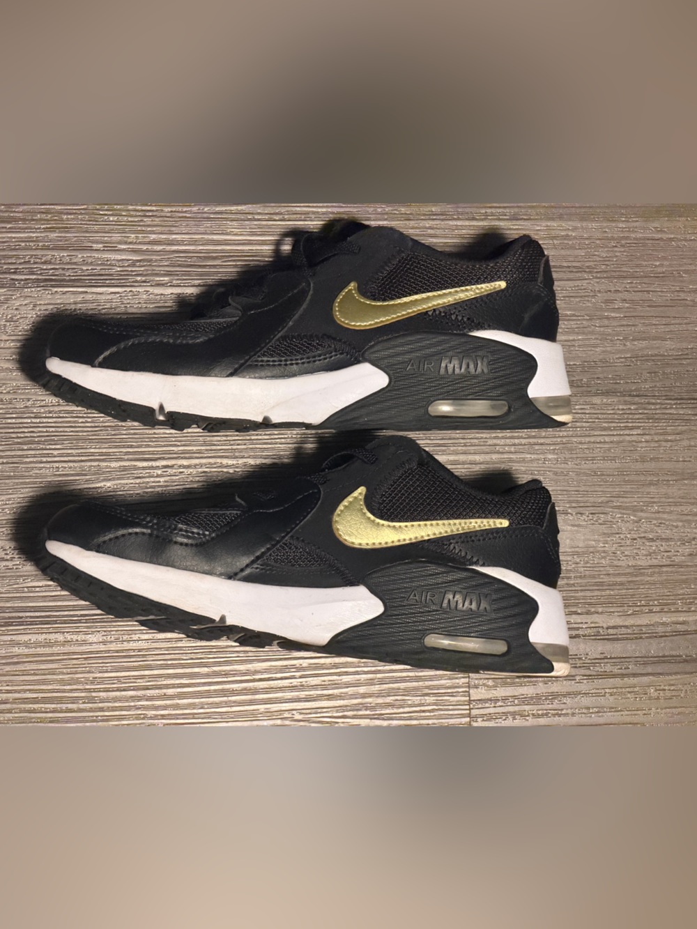 Nike Kids Black Sneakers with Gold Swoosh